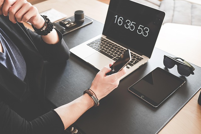 ambitious person planning goals on laptop in modern European apartment workspace